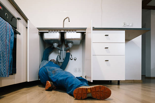 Professional Emergency Plumber technician working in Vine Grove, KY